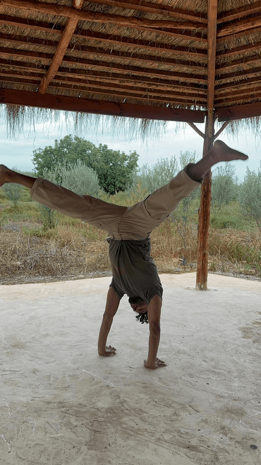 Handstand practice at Farm El Baya
